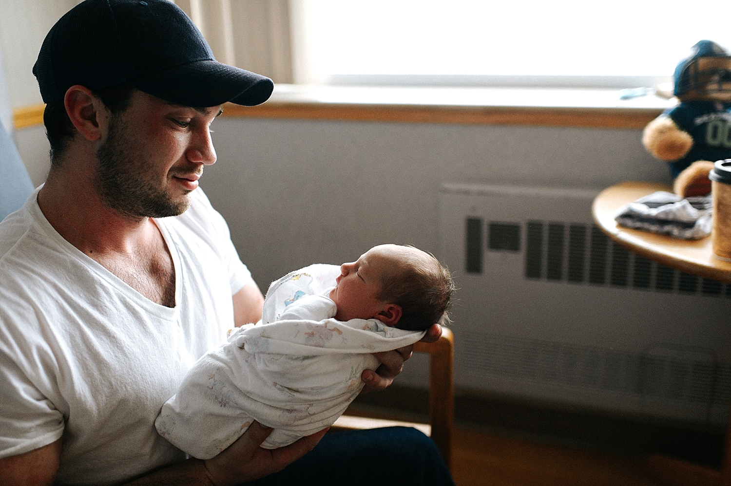 Dad with baby girl during Newborn Fresh48 Session | Meg Newton Photography