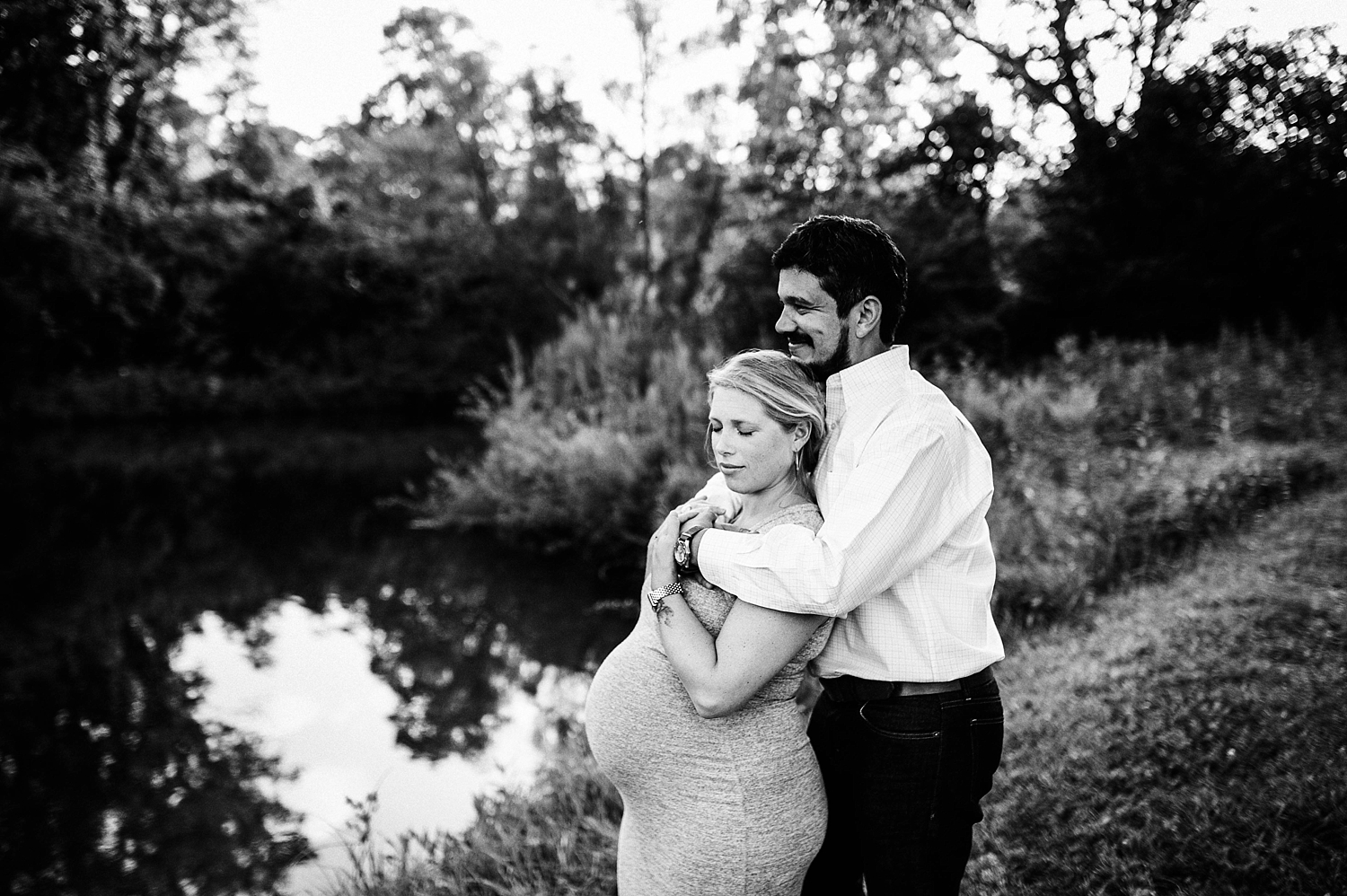 Beautiful black and white photo of mom and dad during Seattle Maternity Session with Meg Newton Photography