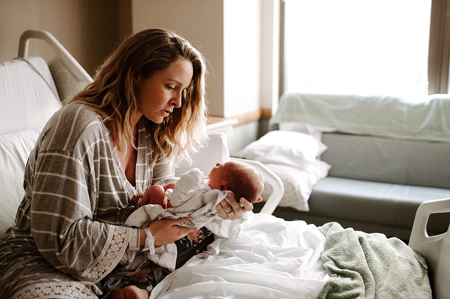Mama calming baby during Fresh48 Session | Meg Newton Photography