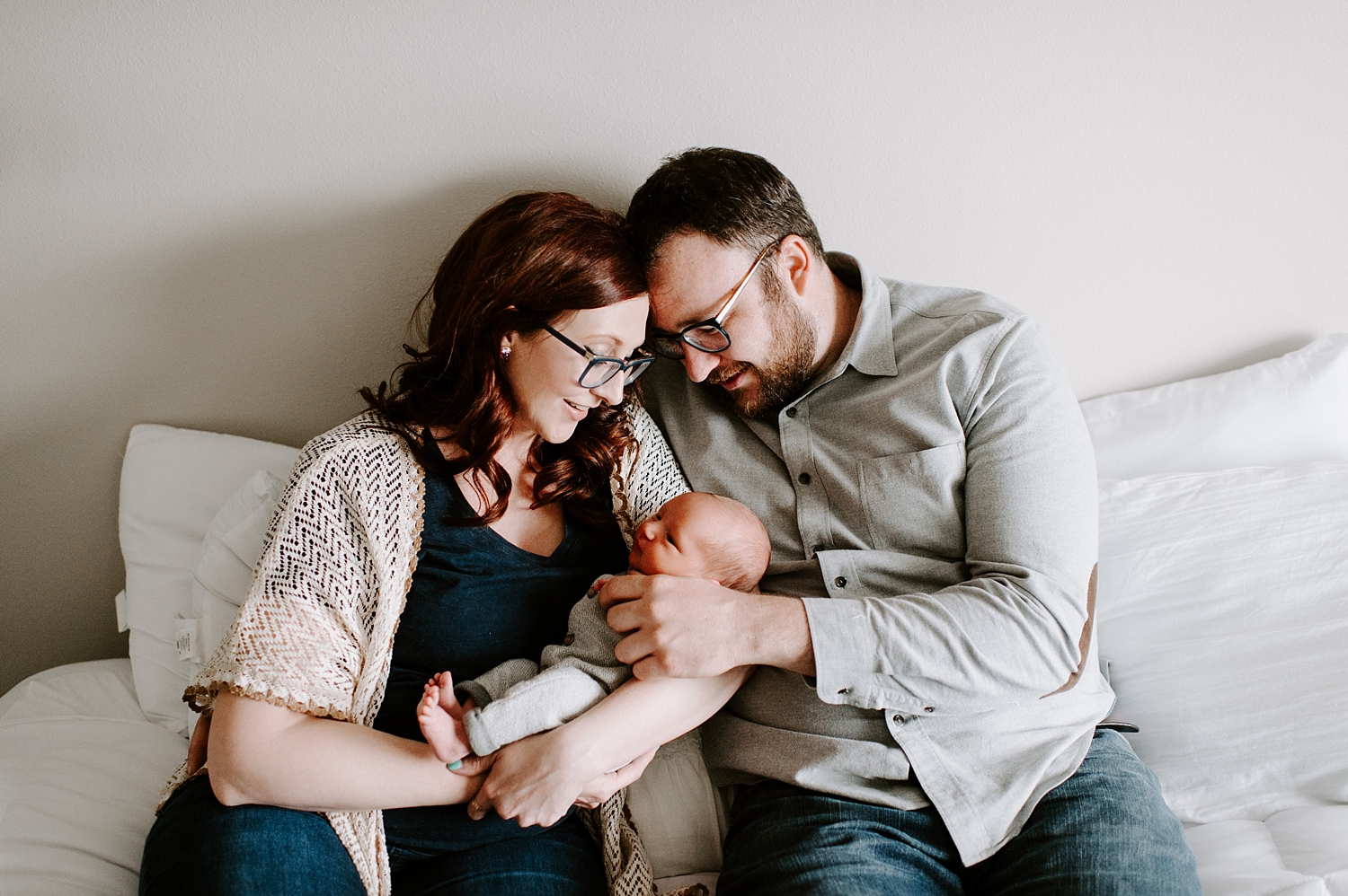 Parents with baby during lifestyle newborn photoshoot in Olympia, WA | Meg Newton Photography 