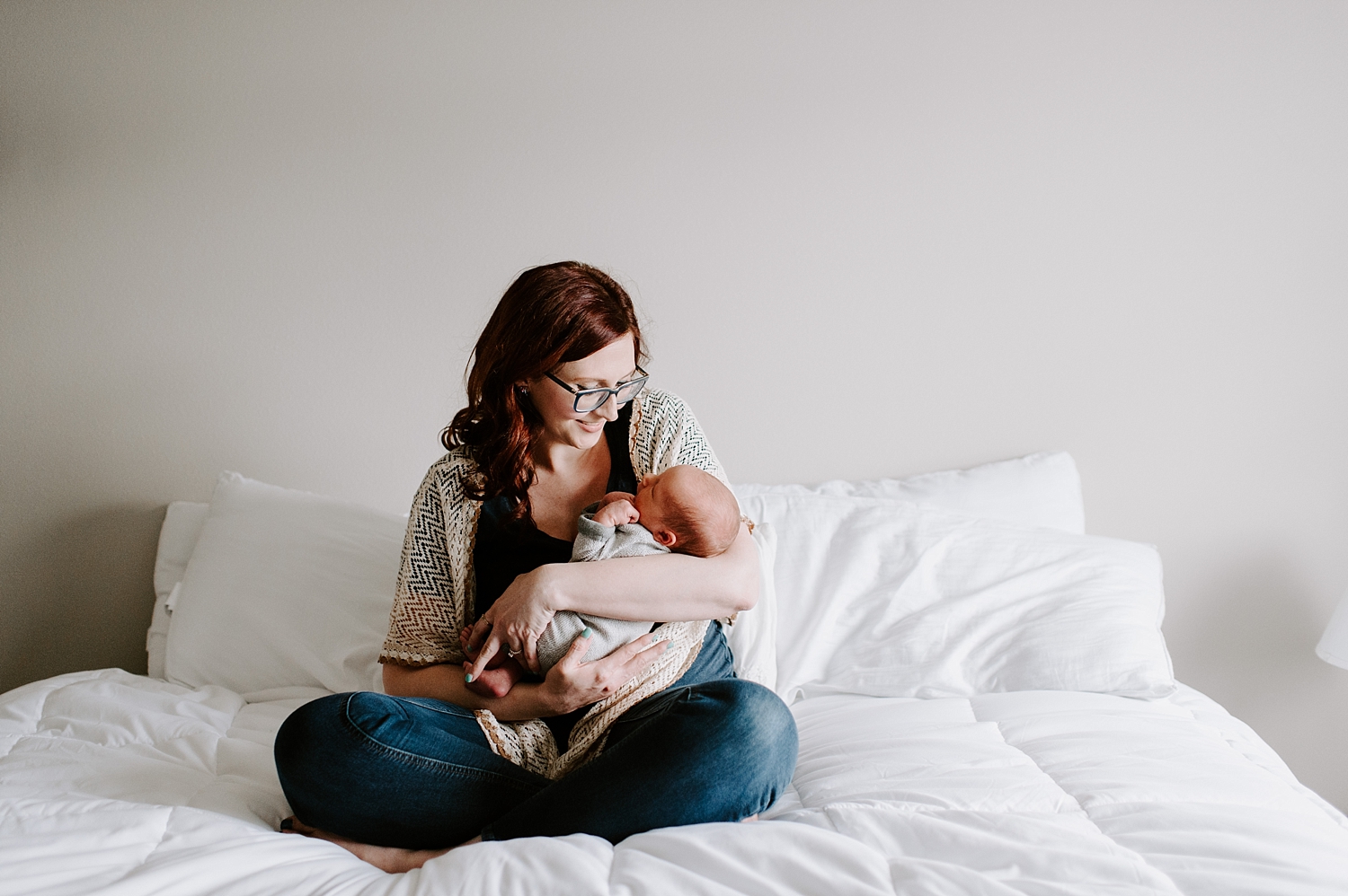 Mama and baby during lifestyle newborn photoshoot | Meg Newton Photography