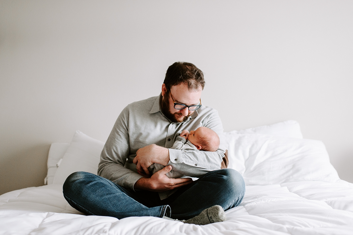 Dad and son during lifestyle newborn photoshoot | Meg Newton Photography 
