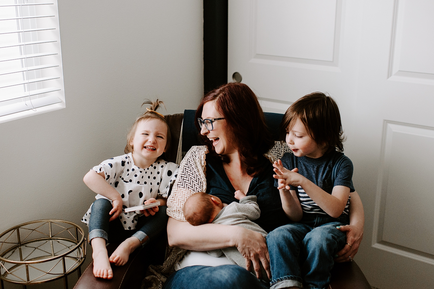 Mama with all three of her kids during baby's newborn photoshoot | Meg Newton Photography 
