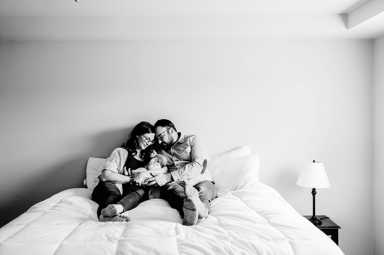 Parents with baby during lifestyle newborn photoshoot in Olympia, WA | Meg Newton Photography