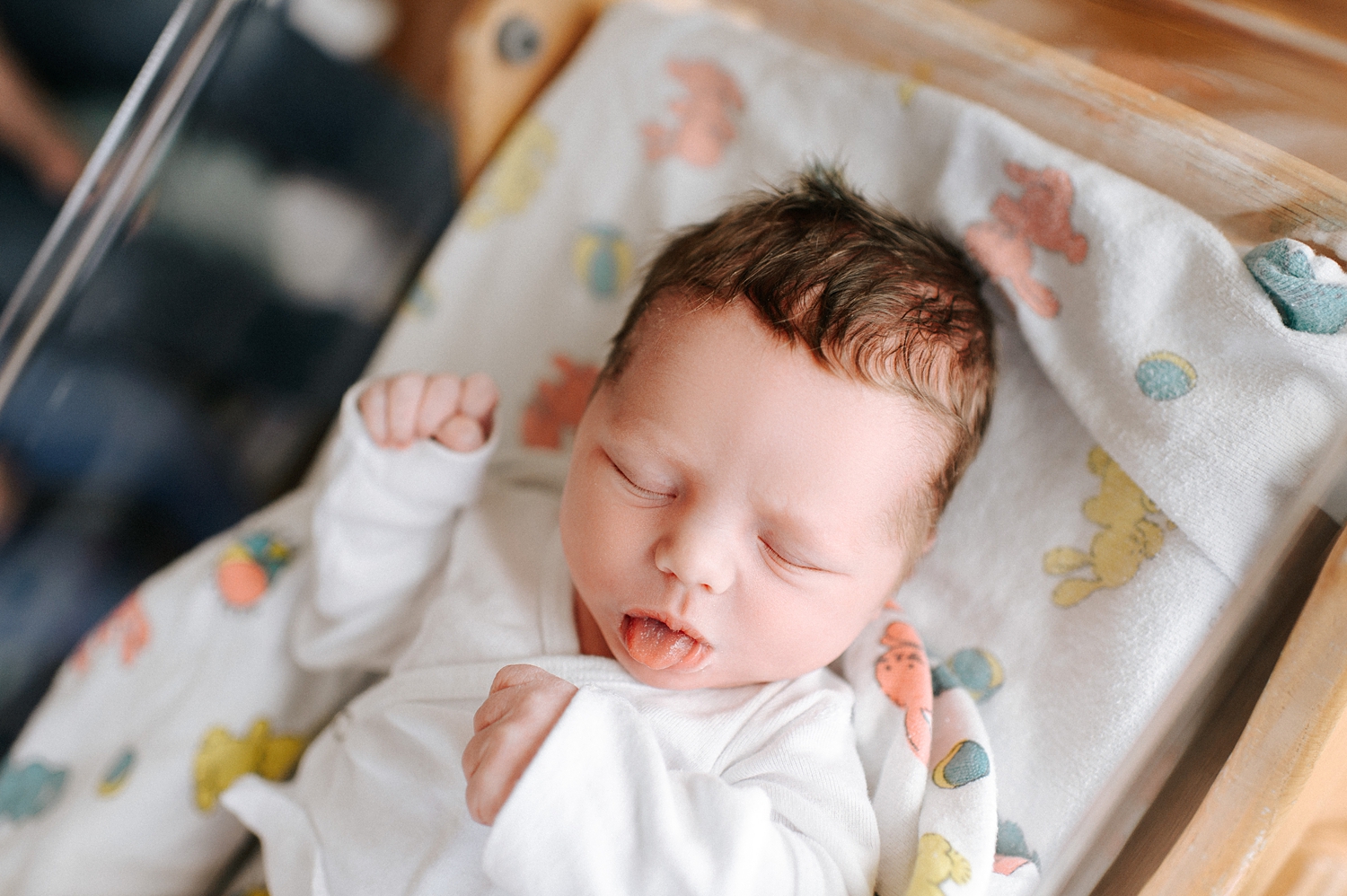 Baby boy sticking his tongue out during Fresh48 Session at Good Sam Hospital in Puyallup | Meg Newton Photography 