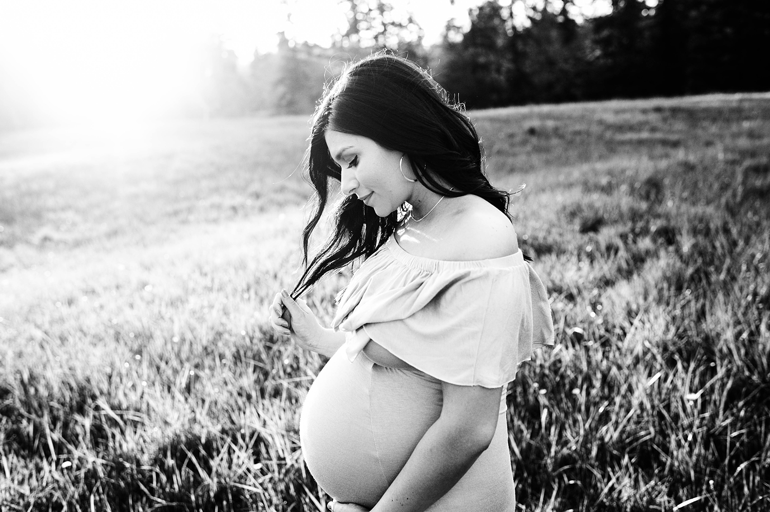 Mama to be during sunset maternity session with Seattle Newborn Photographer, Meg Newton Photography