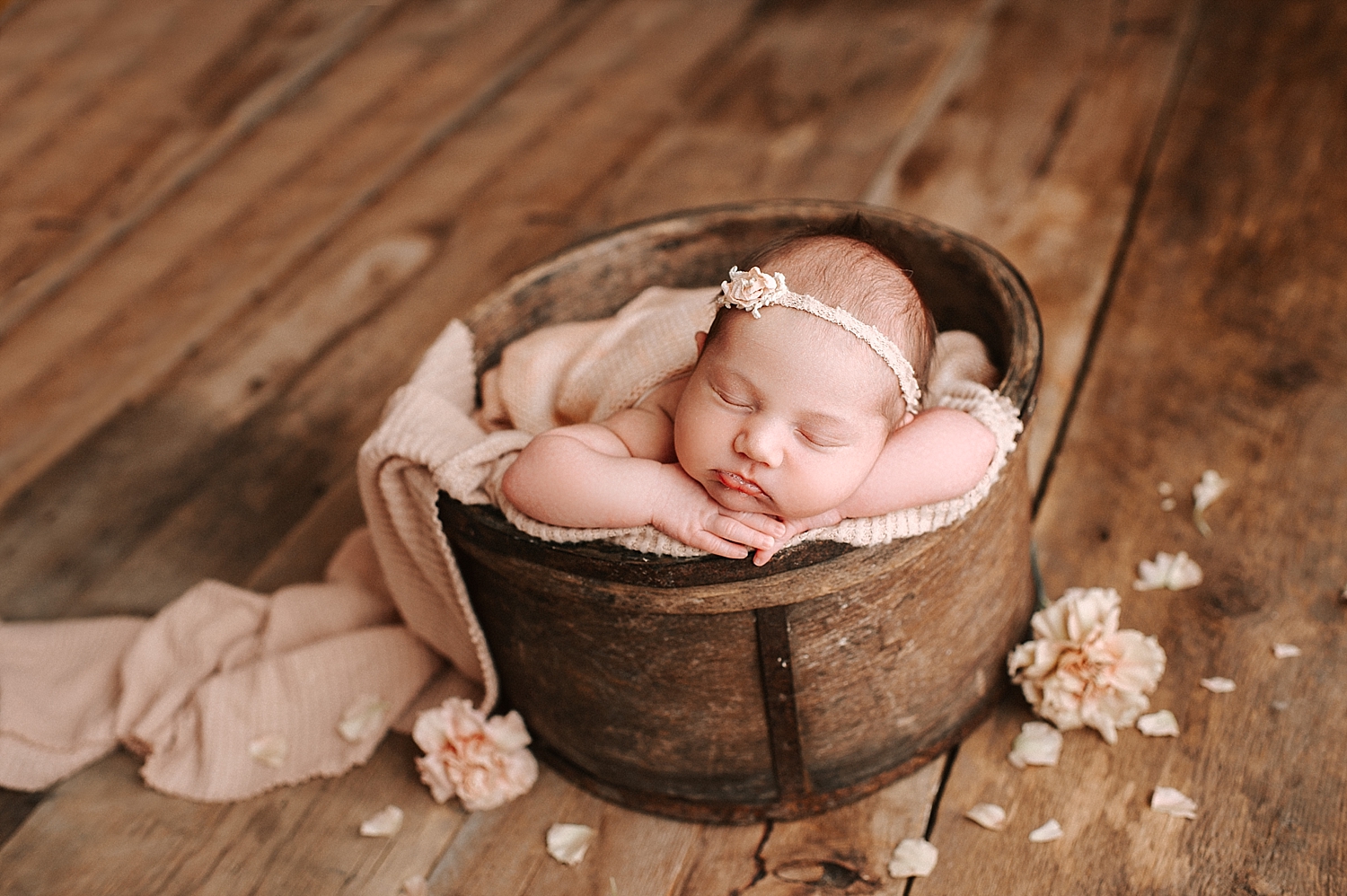Newborn baby in a basket | Meg Newton Photography