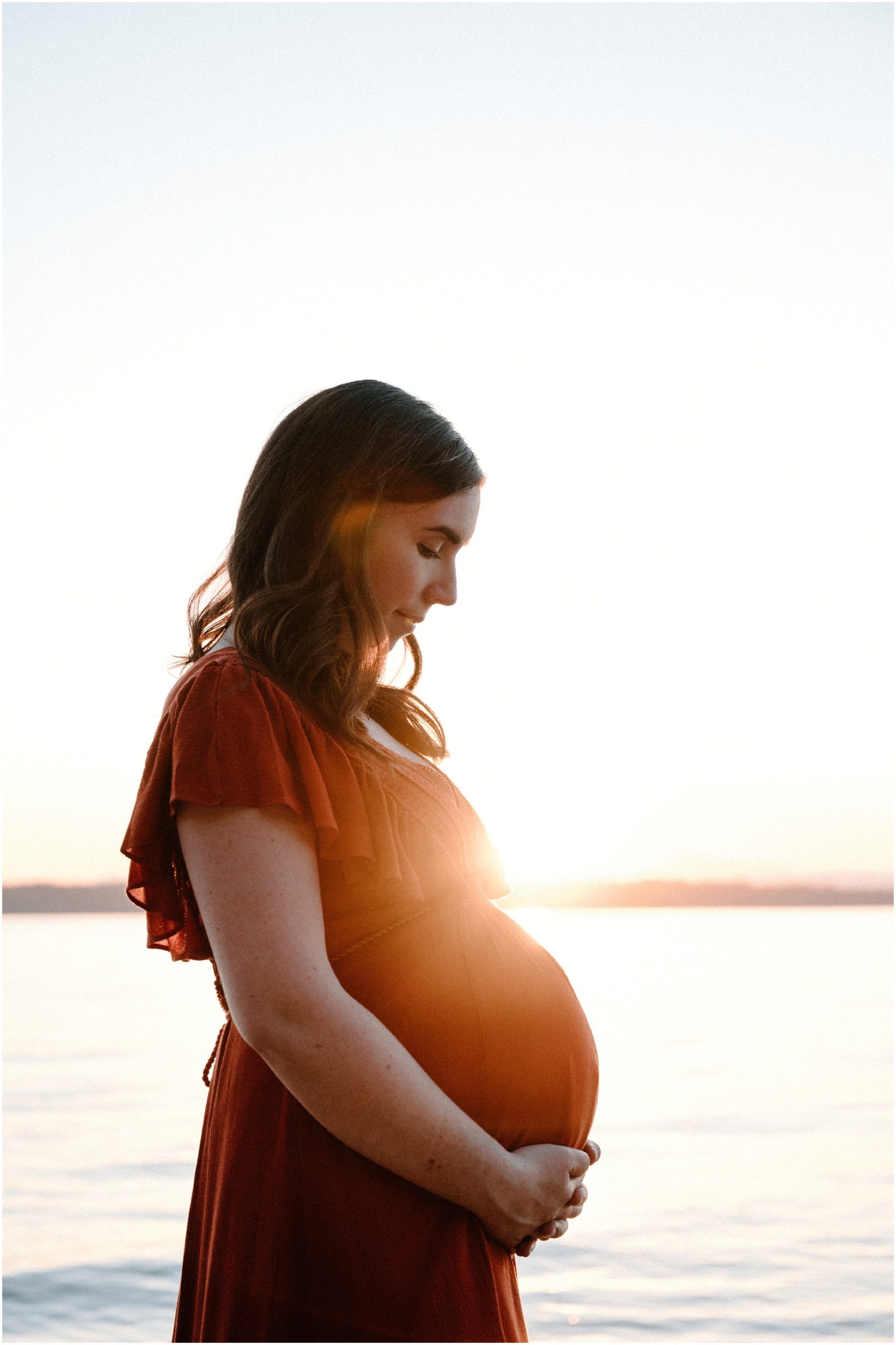 Portrait of pregnancy. Photo by Meg Newton Photography.