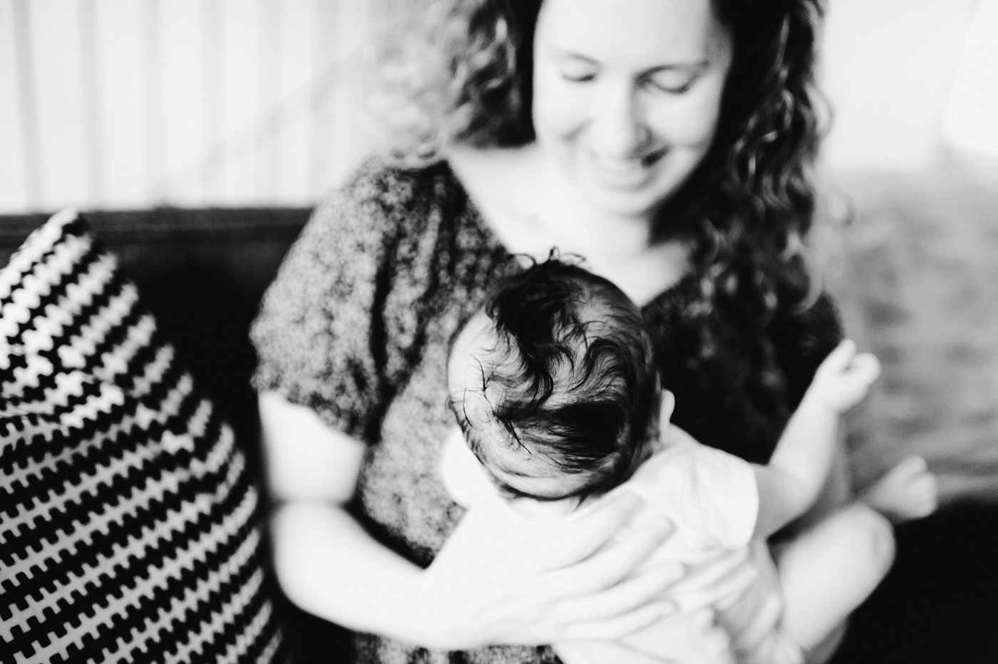 Details of hair on baby boy during Seattle lifestyle newborn session. Photo by Meg Newton Photography.