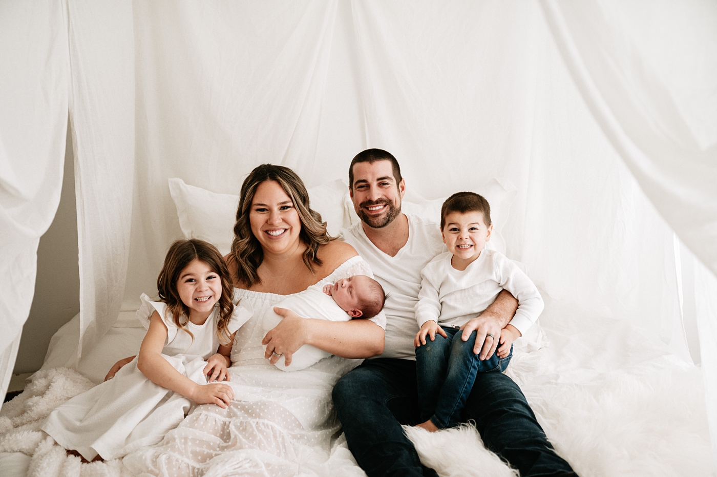 Family of five photographed in Tacoma Studio. Photo by Meg Newton Photography.